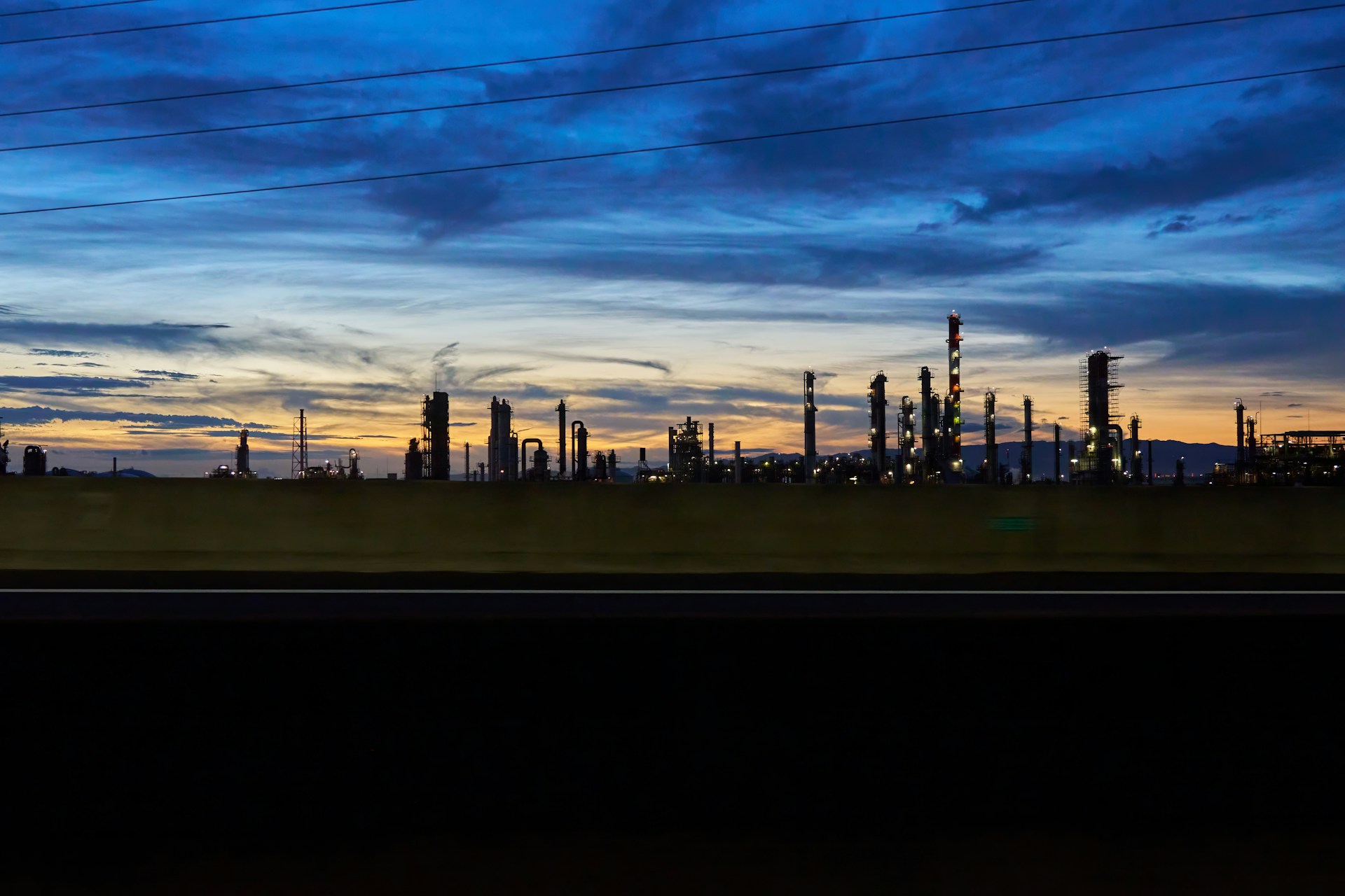 Oil refinery and downstream plant at dusk